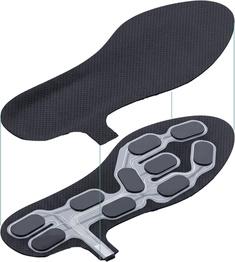 The Stride One insole, top layer lifted to show the sensor array underneath